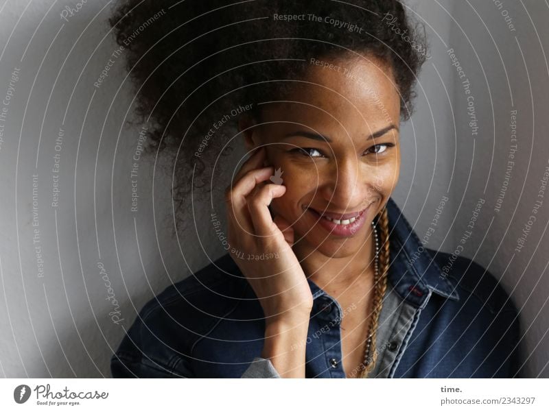 Lilian Room Feminine Woman Adults 1 Human being Shirt Hair and hairstyles Brunette Long-haired Curl Braids Afro Observe To hold on Smiling Laughter Looking Wait