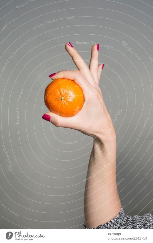 hand holding an orange in original shape Food Fruit Orange Nutrition Eating Breakfast Organic produce Vegetarian diet Diet Lifestyle Joy Healthy Health care