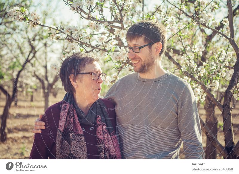 Mum and son talking and smiling Lifestyle Joy Care of the elderly Wellness Well-being Contentment Parenting Human being Woman Adults Man Female senior Mother