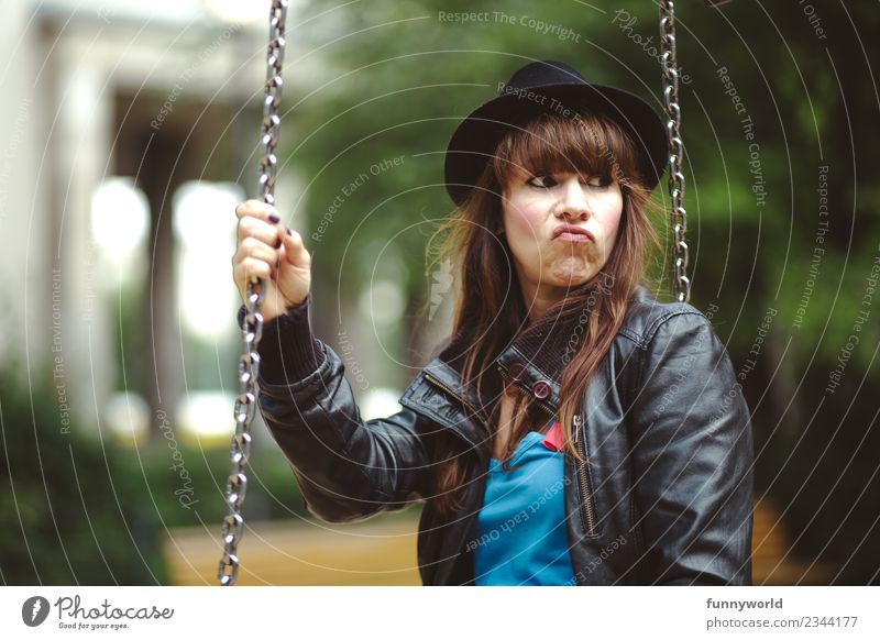 Woman with hat sits on swing and distorts face Feminine Adults 1 Human being 30 - 45 years Cool (slang) Emotions High spirits Comfortable Frustration Swing