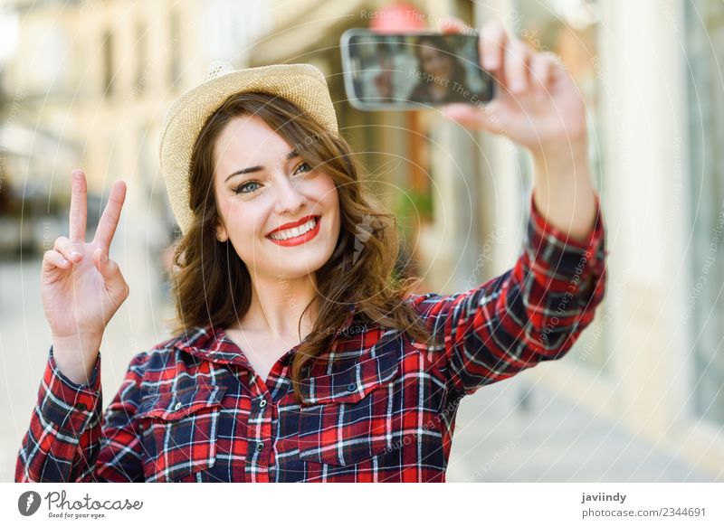 Young woman selfie in the street with a smartphone Style Joy Happy Beautiful Hair and hairstyles Face Vacation & Travel Telephone PDA Camera Human being