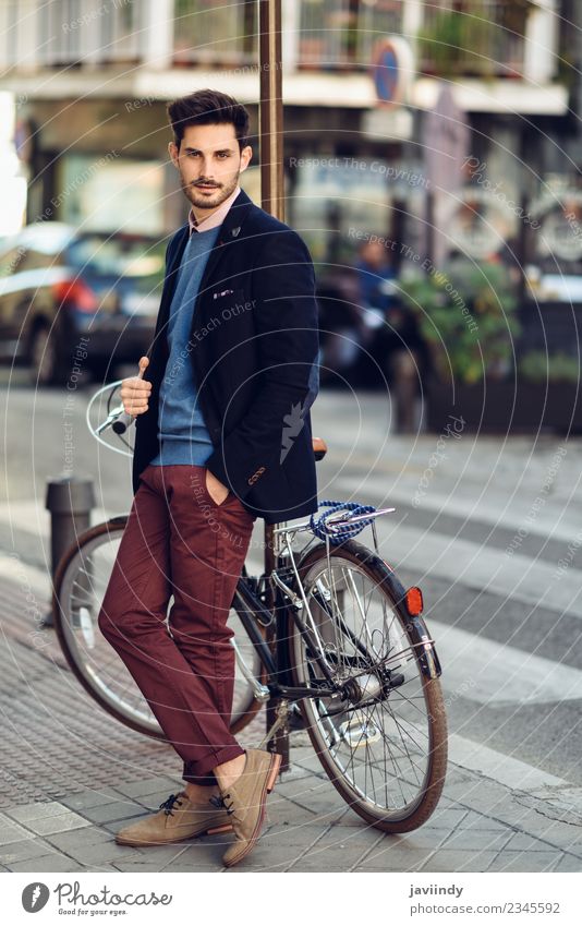 Man in the street wearing suit near a vintage bicycle. Lifestyle Elegant Style Beautiful Hair and hairstyles Business Human being Masculine Young man