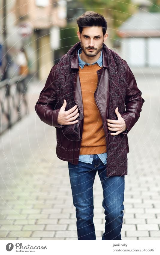 Attractive young man walking in an urban road Lifestyle Style Beautiful Hair and hairstyles Human being Masculine Young man Youth (Young adults) Man Adults 1