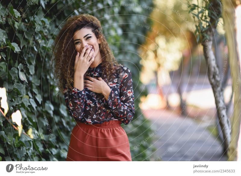 Beautiful young arabic woman laughing Lifestyle Joy Hair and hairstyles Human being Young woman Youth (Young adults) Woman Adults 1 18 - 30 years Autumn Street