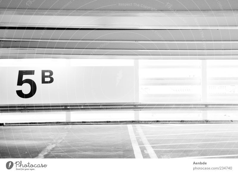 5B Parking garage Esthetic Sharp-edged Typography Minimalistic Graphic Crash barrier Back-light Lane markings Asphalt Parking level Black & white photo