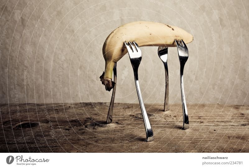 banana Food Fruit Banana Fresh Impaled Fork Art Stand Esthetic Exceptional Delicious Brown Yellow Bizarre Colour photo Subdued colour Interior shot Studio shot