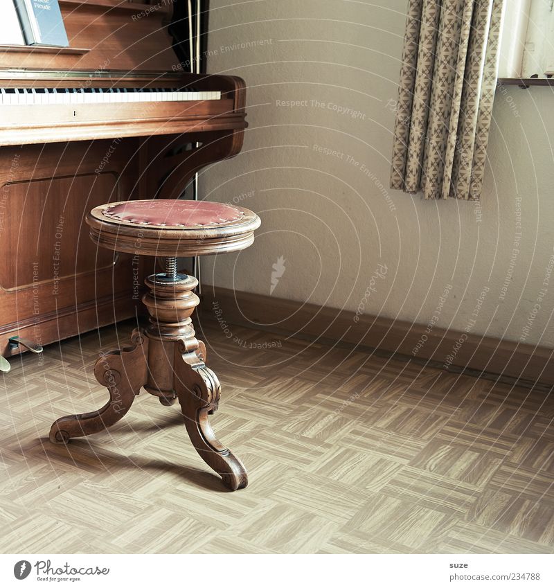 wooden toy Leisure and hobbies Living or residing Flat (apartment) Music Piano Wood Old Brown Past Stool Linoleum Floor covering Keyboard Sound Piano stool