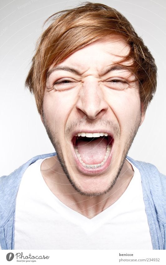 sound Man Human being Youth (Young adults) Portrait photograph Scream Teeth Loud Anger Aggression Close-up Studio shot White Blue Looking into the camera