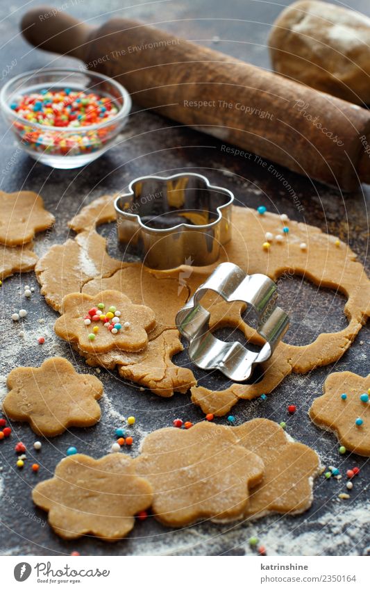 Cooking cookies with cookie cutters on a dark table Dough Baked goods Dessert Kitchen Flower Metal Make Brown Tradition Baking Bakery biscuit cooking