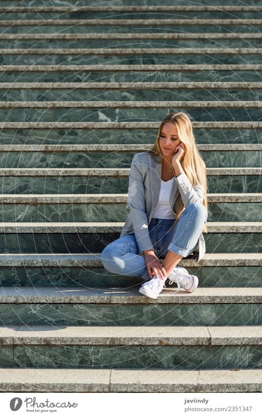 Thoughtful young caucasian woman in urban steps Lifestyle Style Beautiful Hair and hairstyles Human being Feminine Young woman Youth (Young adults) Woman Adults