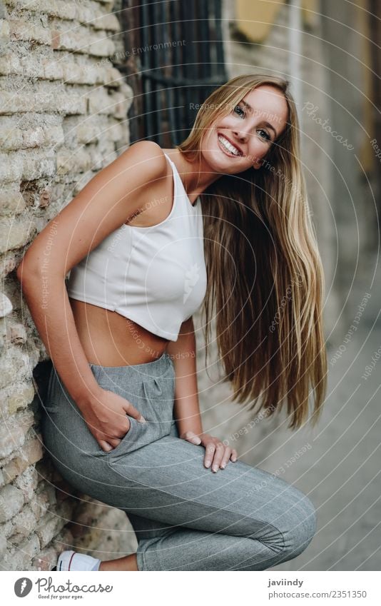 Smiling blond girl wearing casual clothes in the street Lifestyle Style Beautiful Hair and hairstyles Summer Human being Feminine Young woman