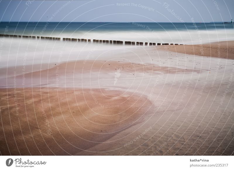 Warnemünde Landscape Sand Water Cloudless sky Horizon Weather Waves Coast Beach Baltic Sea Ocean Lighthouse Moody Patient Calm Loneliness Contentment Relaxation