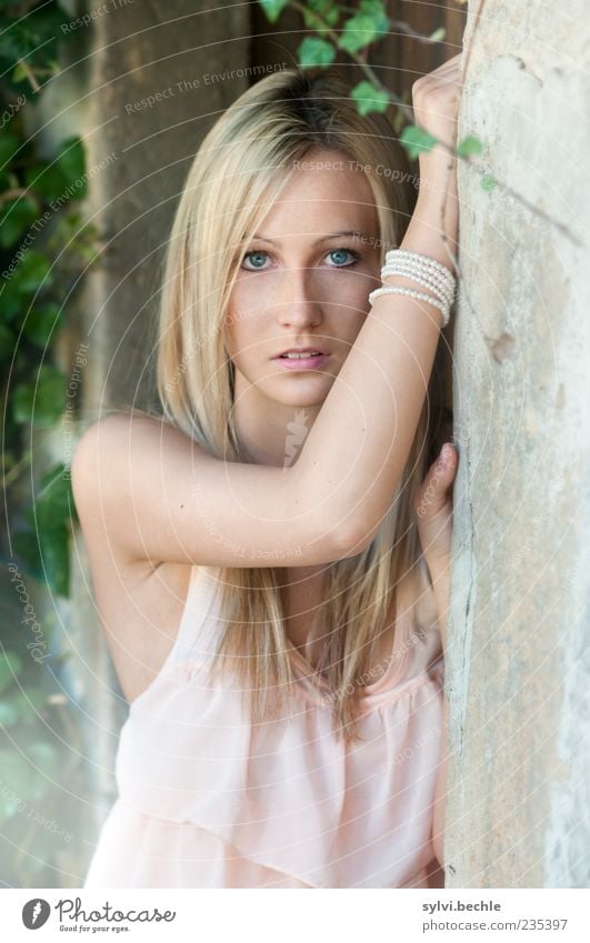 A Portrait Human being Feminine Young woman Youth (Young adults) Hair and hairstyles Face Arm 1 Plant Wall (barrier) Wall (building) Accessory Jewellery Blonde