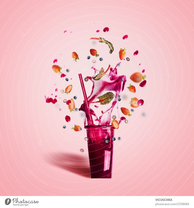 Fruit summer drink splashes out of the glass Food Beverage Cold drink Lemonade Juice Style Design Healthy Healthy Eating Summer Hip & trendy Pink Milkshake