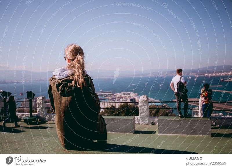 Young woman is sitting on top of Mountain looking at the ocean Dusk Emotions Girl Happy Life Lifestyle Summer Sun Sunset Warmth Youth (Young adults) Adventure