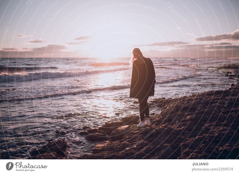 Young woman on the beach watching amazing sunset Beach Dusk Emotions Happy Life Lifestyle Spain Summer Sun Sunset Warmth Adventure Communicate Communication