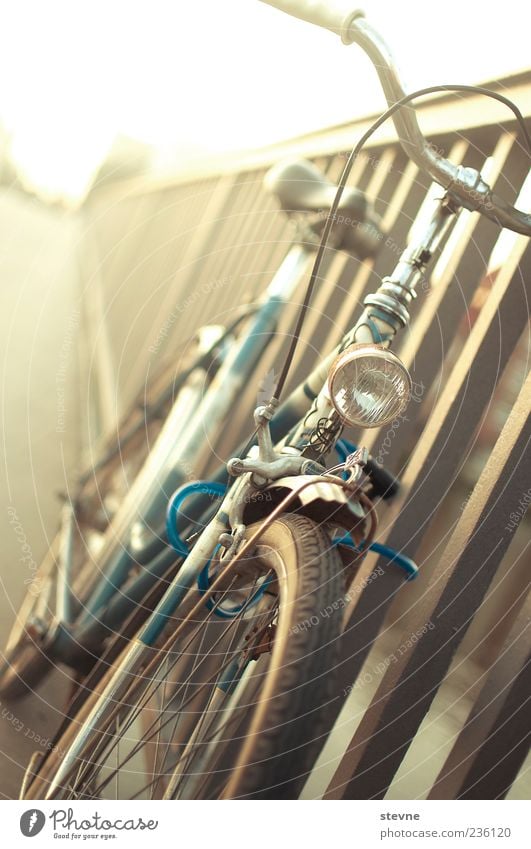 b i c y c l e. Bicycle Bridge Colour photo Close-up Twilight Light Back-light Bridge railing Parking area Ajar Closed Safety 1 Bicycle light Deserted