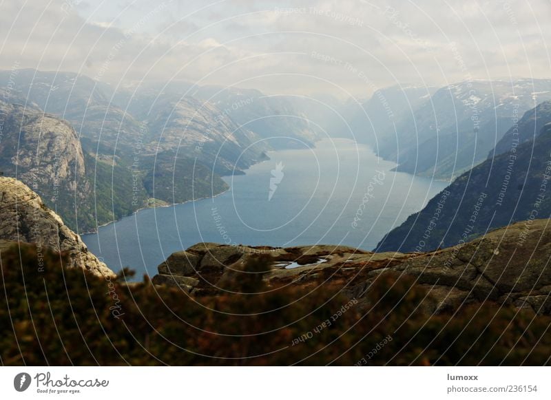 Lysefjord Vacation & Travel Far-off places Mountain Nature Landscape Water Clouds Fjord Norway Europe Deserted Tourist Attraction Exceptional Blue Gray