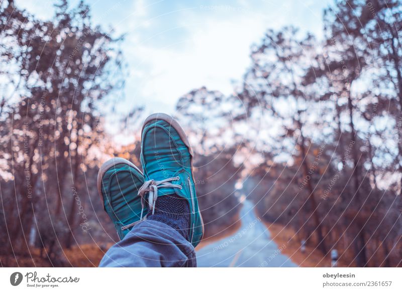 young asian man sit in a truck and looking at his feet Lifestyle Style Human being Man Adults Feet Building Aircraft Fashion Jeans Footwear Old Stand