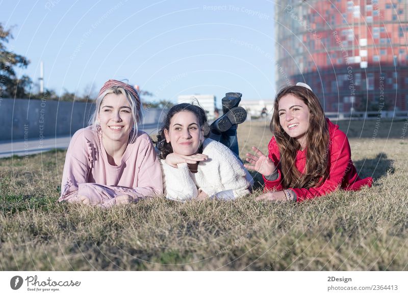 Three happy teenage friends having fun in spring park Lifestyle Joy Happy Face Leisure and hobbies Playing Summer Sports Child Human being Feminine Young woman