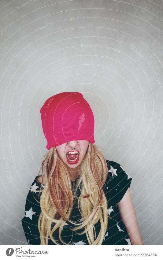 Angry young woman covered by a woolen hat Style Hair and hairstyles Face Human being Feminine Young woman Youth (Young adults) 1 18 - 30 years Adults Piercing