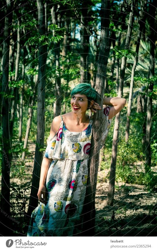 Young woman in the forest Well-being Youth (Young adults) 13 - 18 years Environment Nature Plant Earth Summer Climate change Weather Beautiful weather Tree