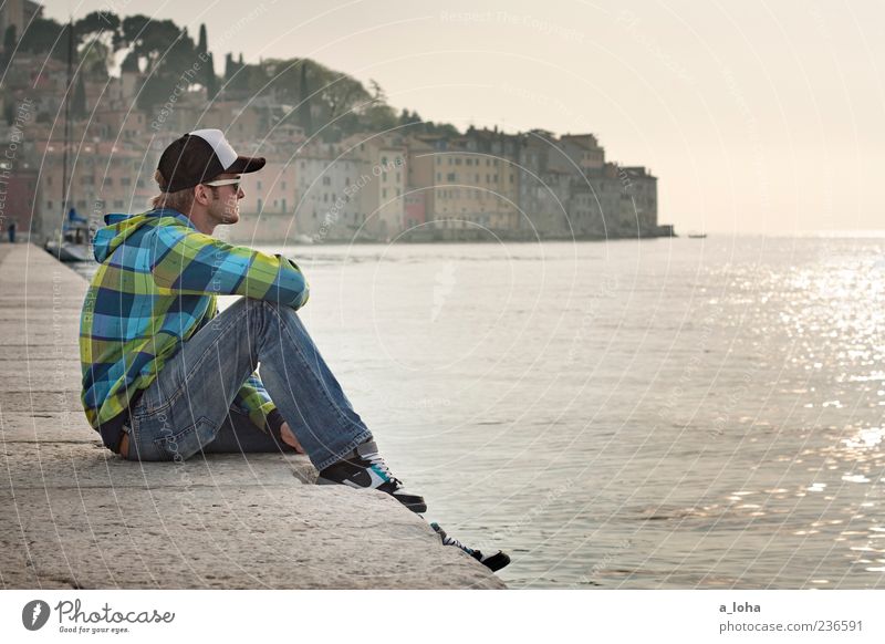 sitting on the dock of the bay Lifestyle Vacation & Travel Tourism Far-off places Sightseeing City trip Masculine Man Adults 1 Human being Water Sky Sunrise