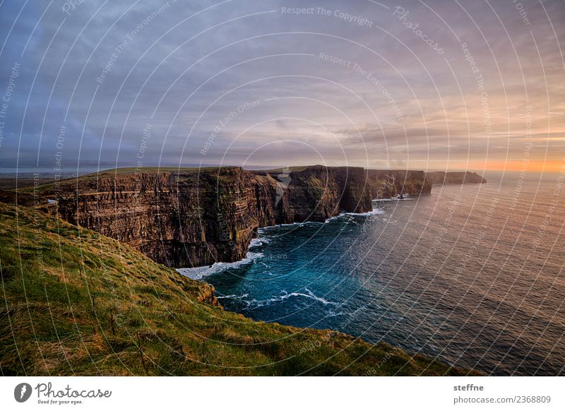 Cliffs of Moher at sunset Nature Landscape Sky Sunrise Sunset Sunlight Spring Esthetic Exceptional Tall Coast Ireland Tourist Attraction Tourism Moody Waves