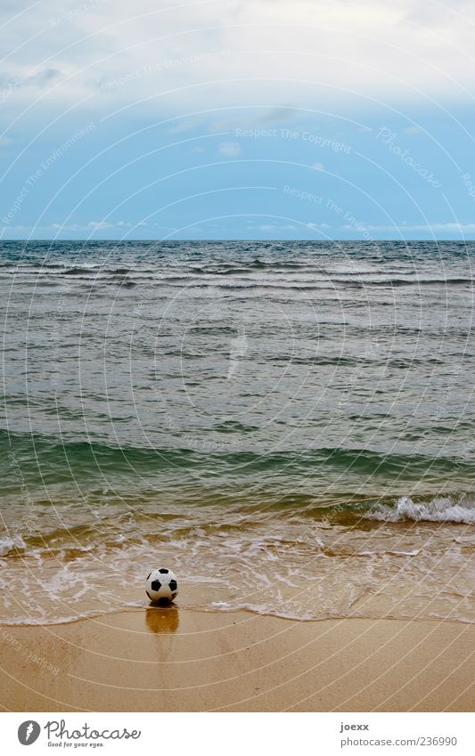 flotsam and jetsam Ball sports Sand Water Sky Clouds Horizon Summer Waves Coast Beach Ocean Blue Brown Green Black White Colour photo Subdued colour