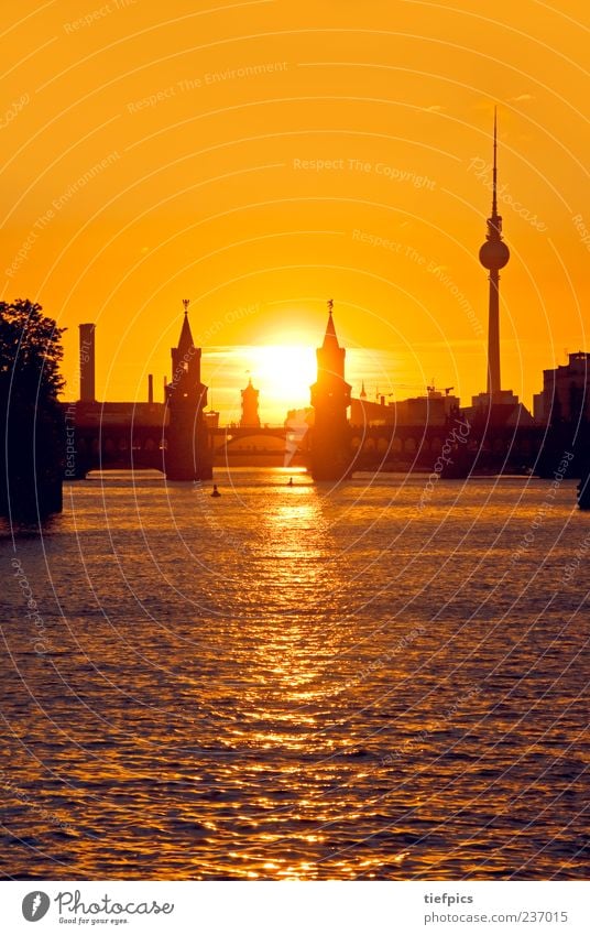 berlin evening glow Tourism River Skyline Bridge Tourist Attraction Landmark Yellow Gold Red Berlin Oberbaumbrücke Sunset Kreuzberg Friedrichshain Spree Orange