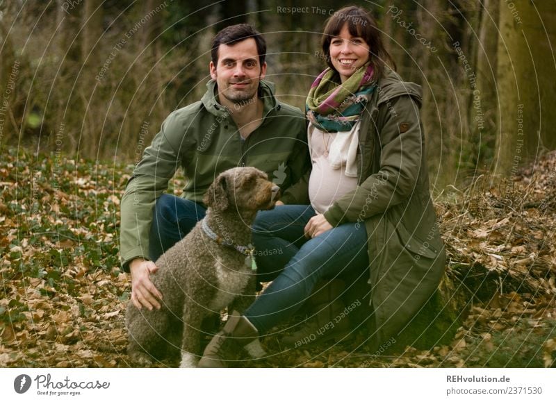 Couple with dog in the forest Lifestyle Leisure and hobbies Human being Masculine Feminine Family & Relations Partner 2 30 - 45 years Adults Environment Nature