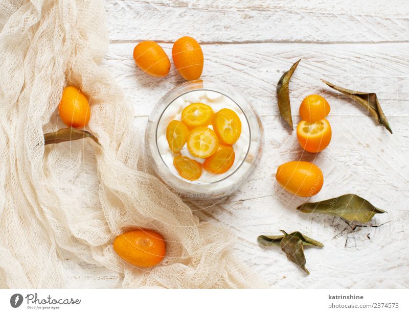 Chia pudding parfait, layered with kumquat and granola Yoghurt Fruit Dessert Eating Breakfast Diet Bowl Spoon Bright Green White Colour Cereal chia Pudding seed