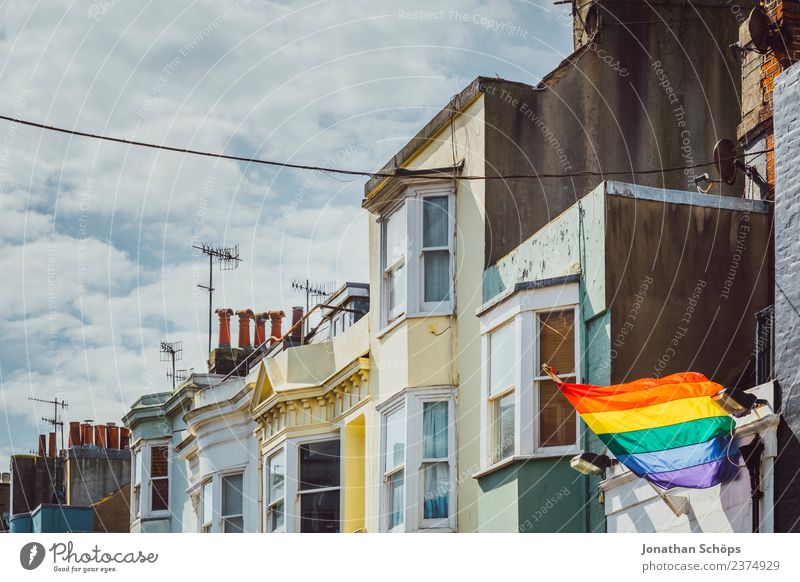 row of houses with rainbow flag Far-off places Freedom City trip Christopher Street Day Sky Clouds Brighton Great Britain Europe Town Port City