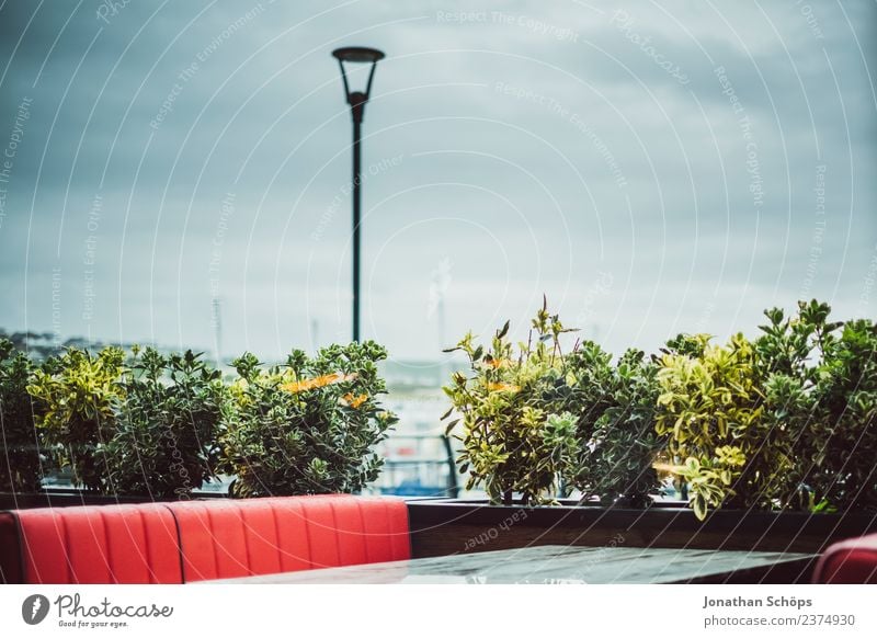 Sitting outside on a rainy day Seating facility Restaurant Empty interdiction red seat Deserted Exterior shot Colour photo Table Free gap Dreary Rain Vacancy