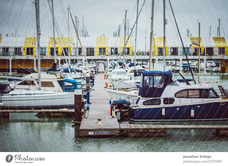 Boats at the harbour, Brighton Marina, England Town Port City Harbour Esthetic Rain Dreary Watercraft Footbridge Navigation Colour photo Exterior shot Deserted