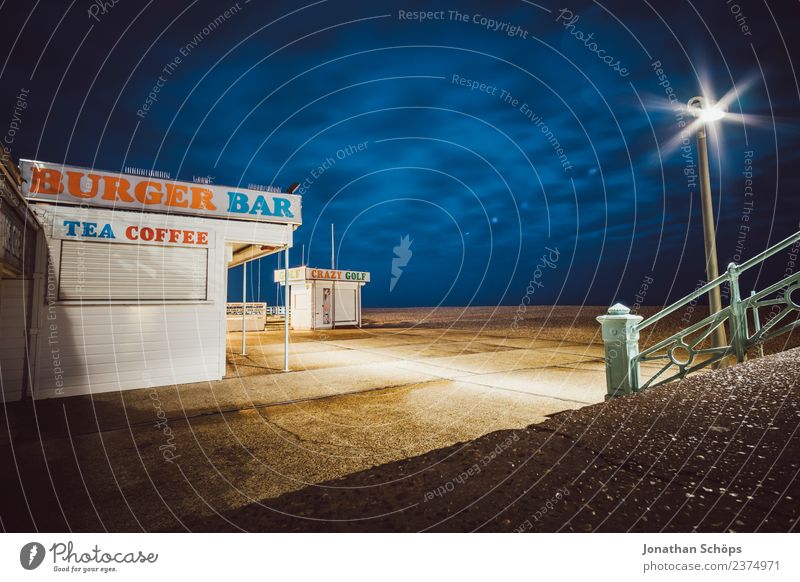 Kiosk at night at Brighton Beach, Brighton, England Esthetic Background picture Dark Light Night mood Night shot Structures and shapes Colour photo