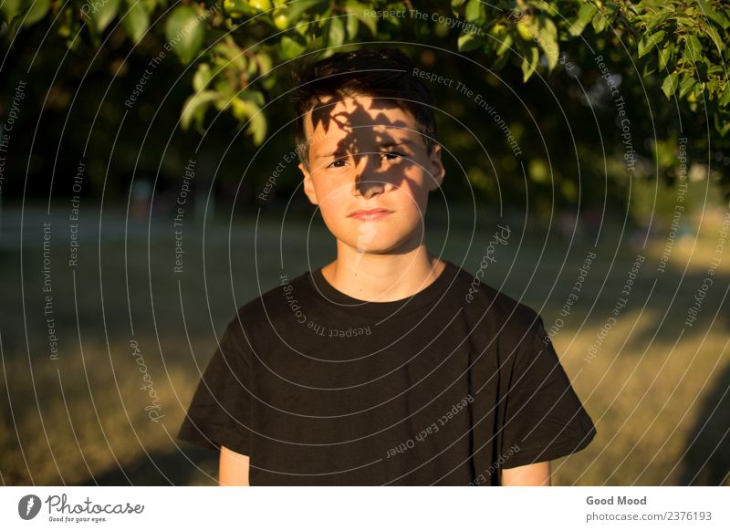 Portrait of young beautiful dreamy teen boy in garden Lifestyle Beautiful Face Leisure and hobbies Vacation & Travel Adventure Summer Sun Garden Human being