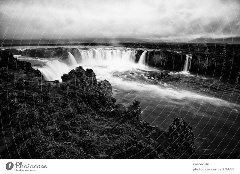 Goðafoss Vacation & Travel Tourism Trip Sightseeing Summer Environment Nature Landscape Elements Water Clouds Bad weather Rain Rock River bank Waterfall