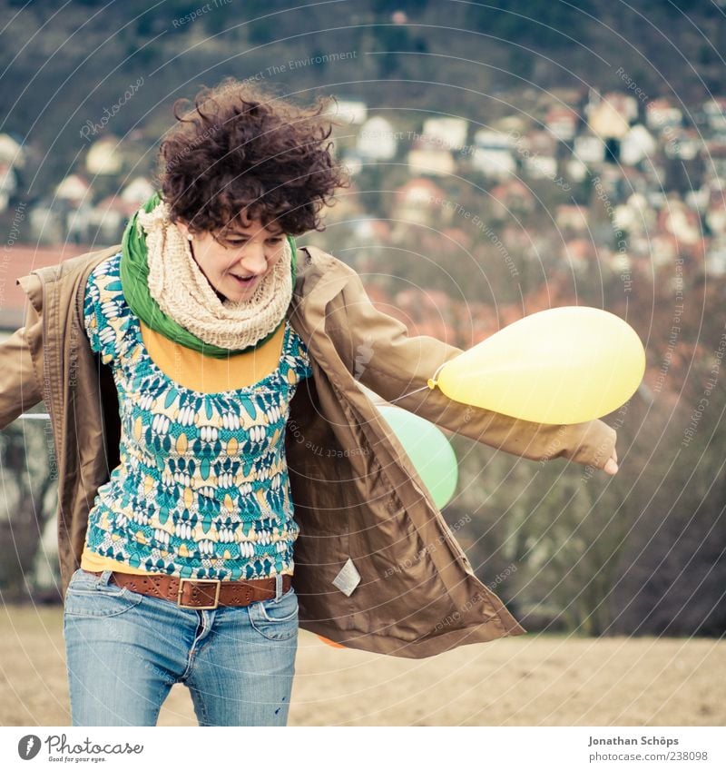 young woman with balloon on the mountain at a city Joy luck Human being Feminine Young woman Youth (Young adults) 1 18 - 30 years Adults Blue Yellow Relaxation