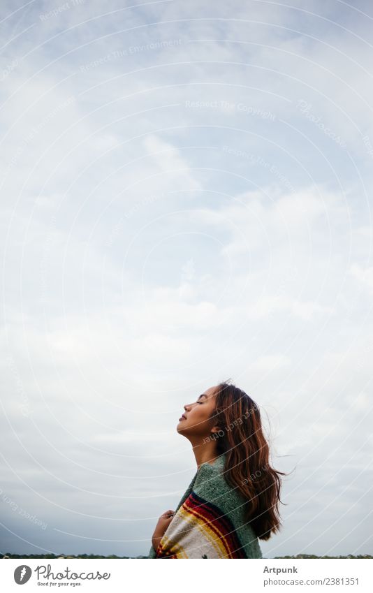 A woman in a thick blanket enjoying nature (vertical) Horizontal Sky Clouds Cold Blanket Nature Camping Hiking Vacation & Travel Woman 18 - 30 years Young woman