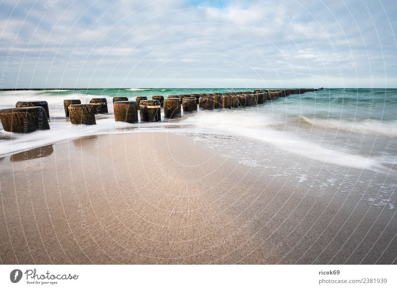 Buhnen at the coast of the Baltic Sea on a stormy day Relaxation Vacation & Travel Tourism Beach Ocean Waves Nature Landscape Water Clouds Gale Coast Wood Blue