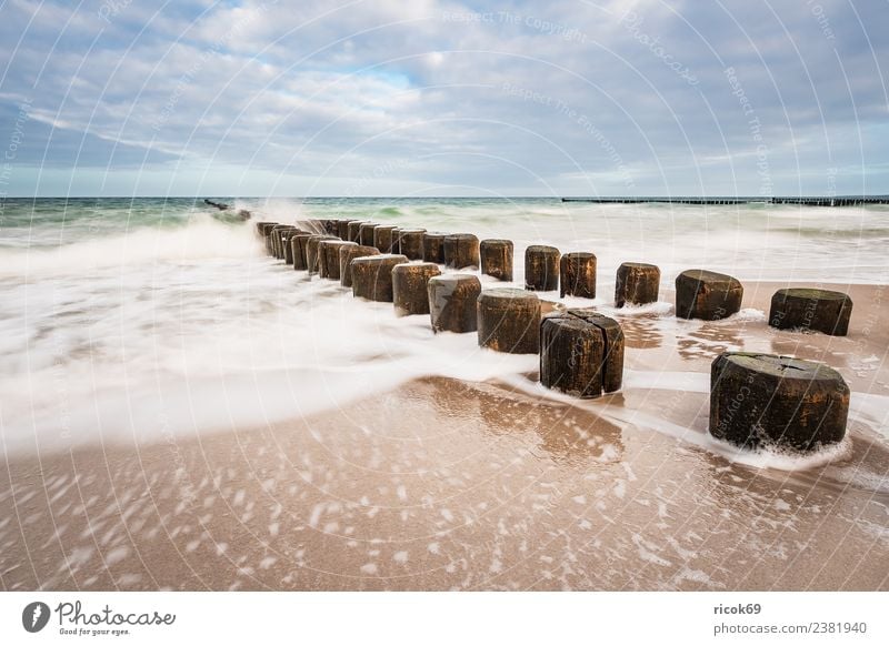 Buhnen at the coast of the Baltic Sea on a stormy day Relaxation Vacation & Travel Tourism Beach Ocean Waves Nature Landscape Water Clouds Gale Coast Wood Blue