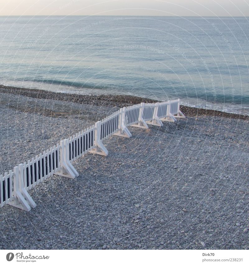 Split beach Beach Ocean Water Coast France Europe Fence Blue Gray White Border Far-off places Horizon Cote d'Azur Dawn Colour photo Exterior shot Deserted