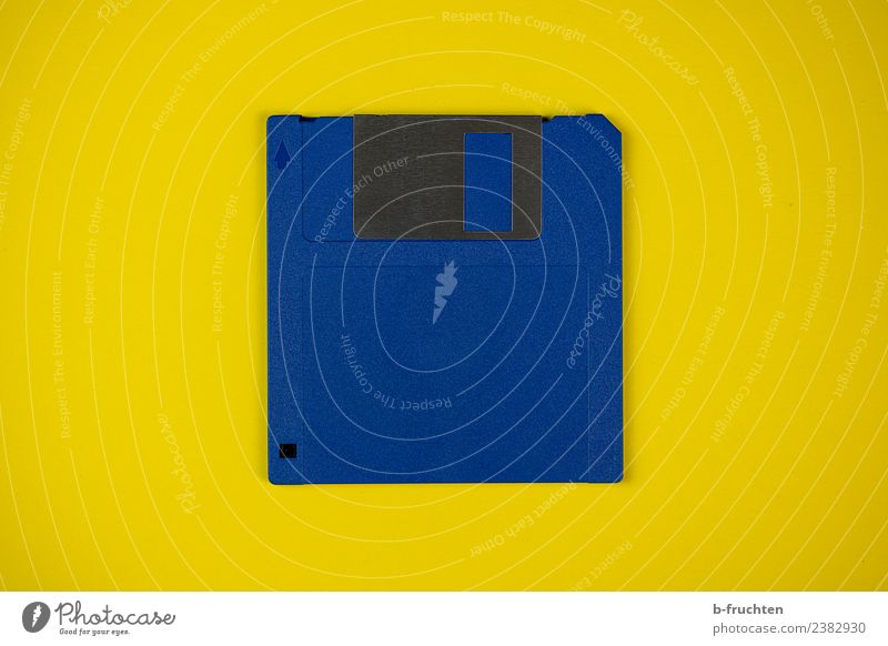 floppy Office Computer Hardware Blue Yellow Change Diskette Data storage Retro Historic Nostalgia Magnetic Old Plastic Digital Studio shot Close-up Deserted