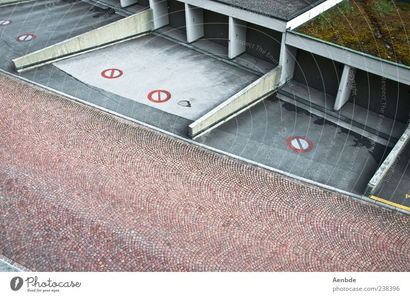 We need more cars. Deserted Building Roof Street Esthetic Garage Garage door Signs and labeling Highway ramp (entrance) Paving stone Colour photo Exterior shot