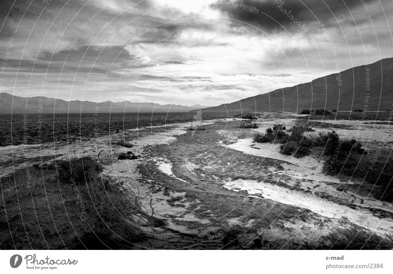 Death Valley California Clouds Moody Back-light USA Black & white photo Landscape Desert Far-off places Panorama (View) Riverbed