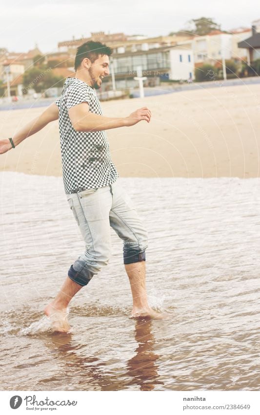 Young man enjoying the day in the beach Lifestyle Style Joy Wellness Well-being Vacation & Travel Tourism Adventure Freedom Summer Summer vacation Sun Beach