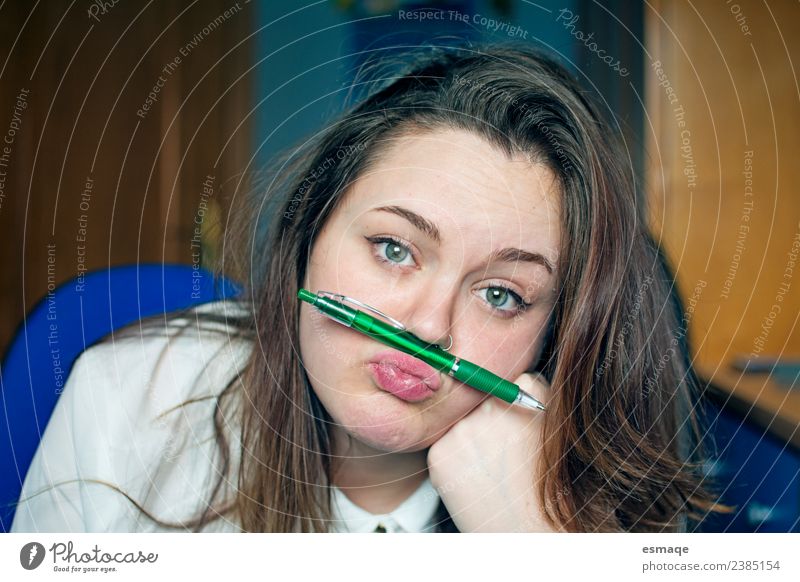 bored young student playing with a ballpoint pen Lifestyle Relaxation Education School Study University & College student Human being Young woman