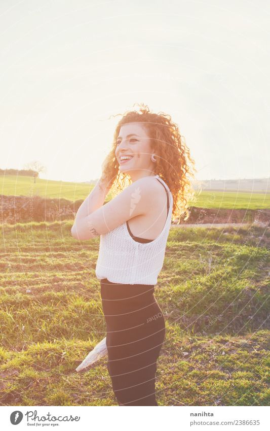 Cheerful woman enjoying the sun at sunset Lifestyle Style Joy Wellness Harmonious Senses Freedom Summer Summer vacation Human being Feminine Young woman