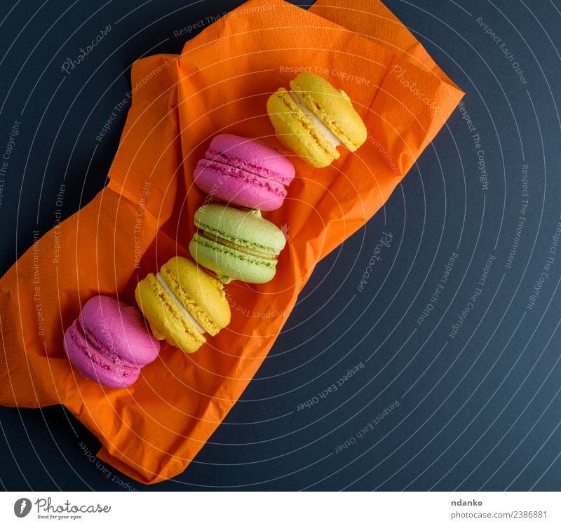 multicolored macarons Dessert Candy Eating Bright Yellow Green Pink Black Colour Macaron background food colorful Vanilla french cake Vantage point Top sweet